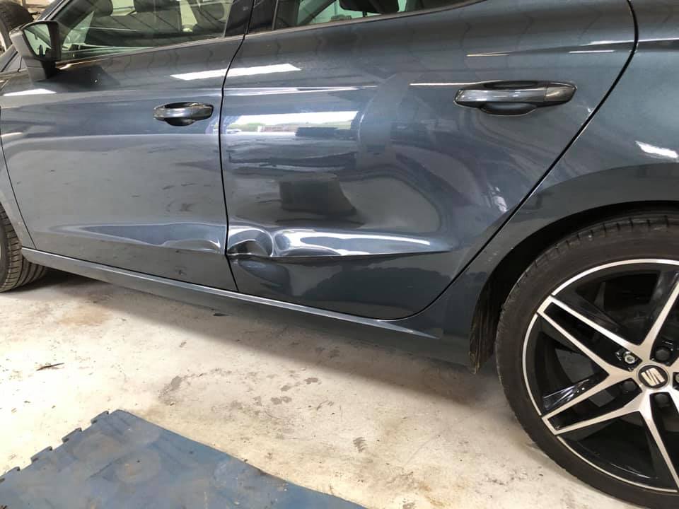 Car with dent ready to be repaired in the Dipit bodyshop